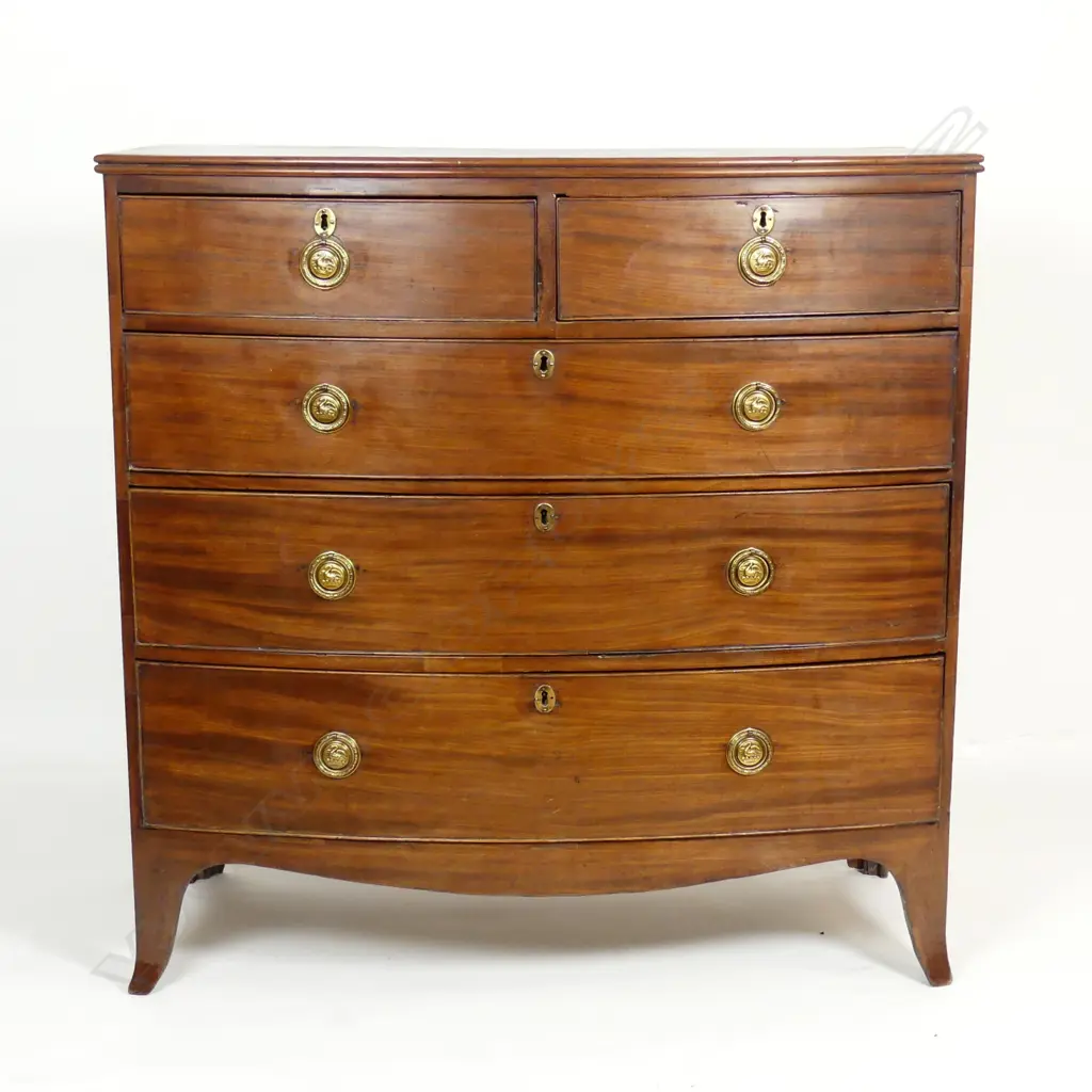 A Georgian mahogany five drawer bowfront chest Image 1++