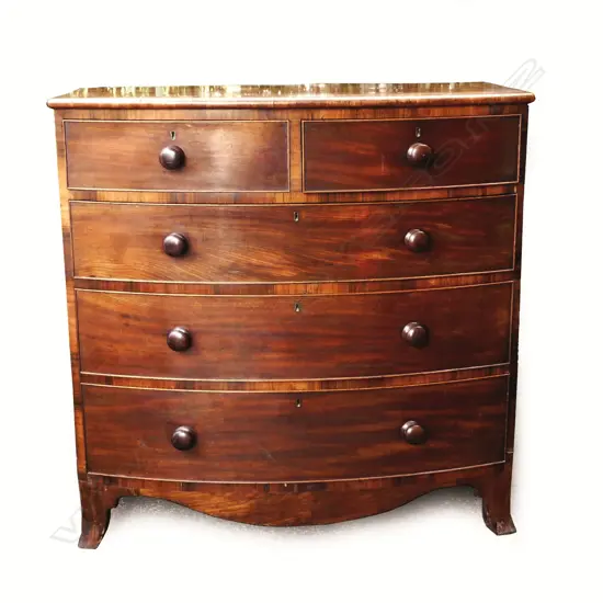 A Georgian mahogany five drawer bowfront chest