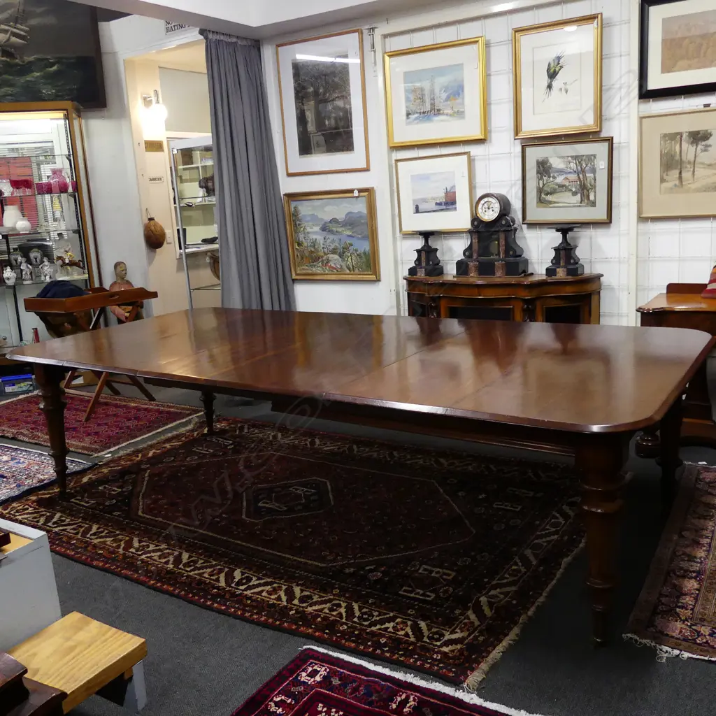 A Victorian mahogany banqueting table Image 1++