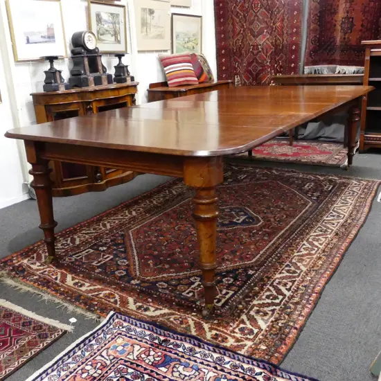 A Victorian mahogany banqueting table