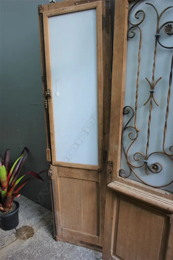 A pair of 19thC French decorative glazed and wrought iron work doors Image 1++