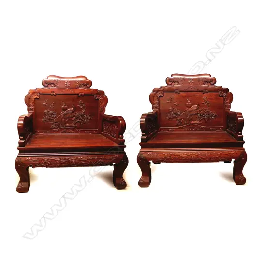 A pair of Chinese rosewood throne style chairs