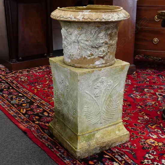 An early NZ terracotta urn on stand