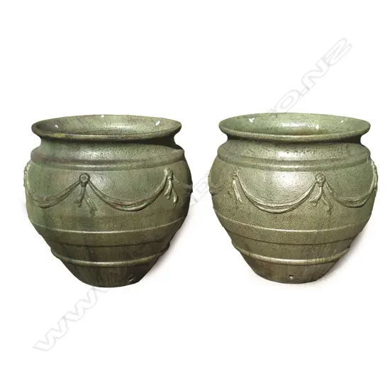 A pair of large and impressive European style garden urns