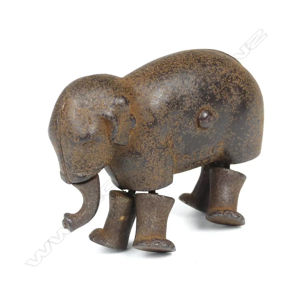 A rare antique metal elephant figure toy Image 1++