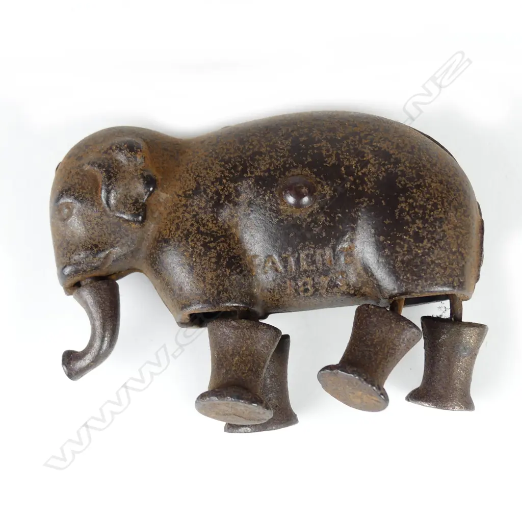 A rare antique metal elephant figure toy Image 1++