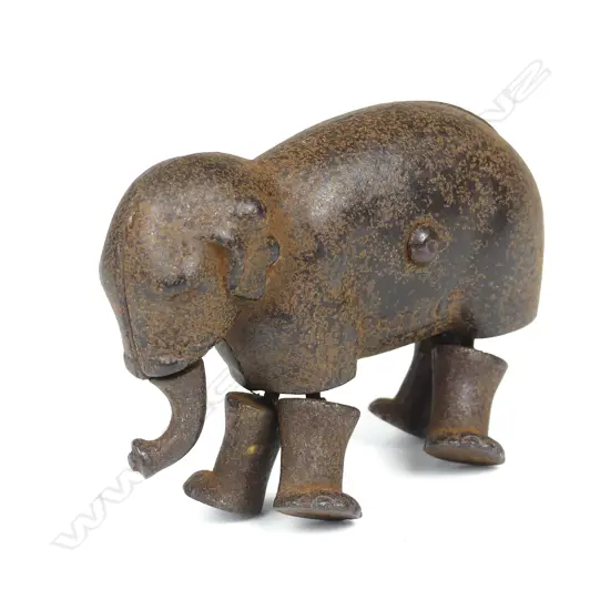 A rare antique metal elephant figure toy