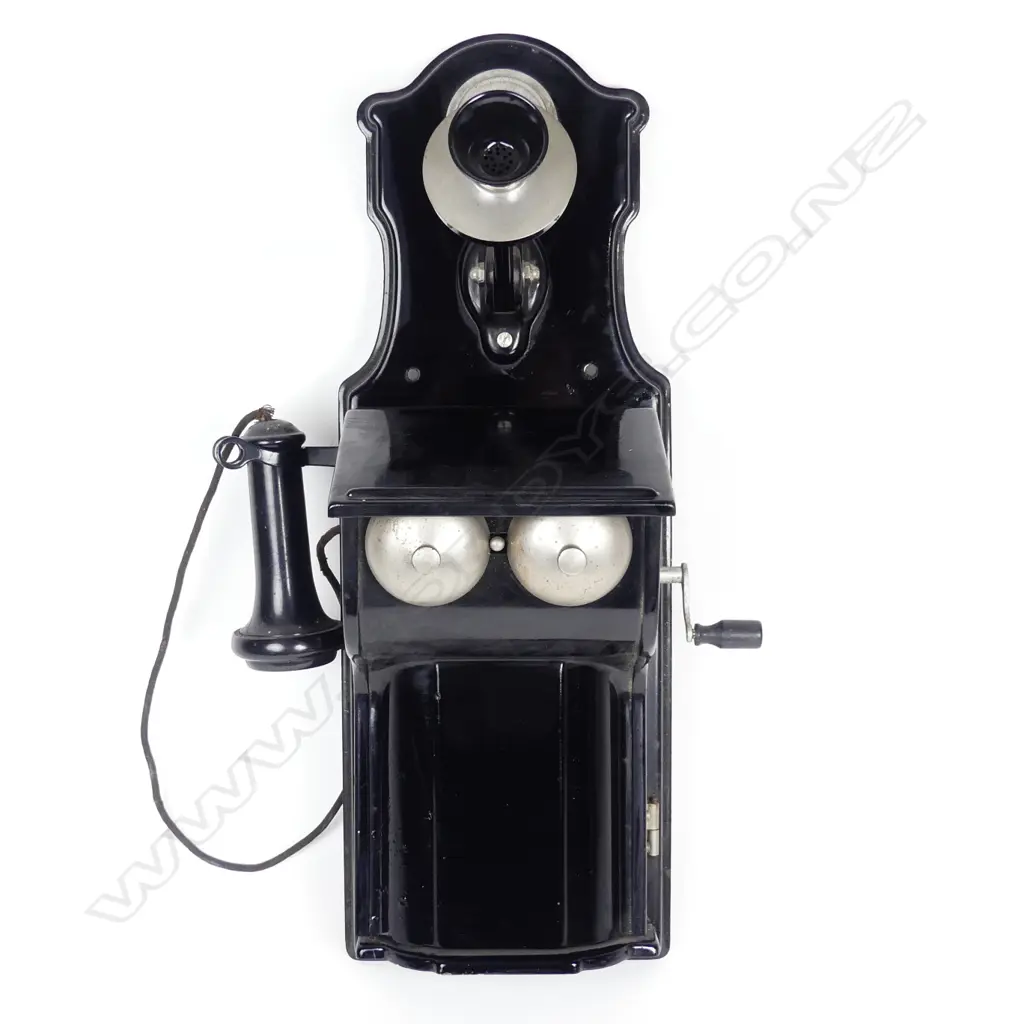 A vintage Stromburg-Carlson enamel wall phone Image 1++