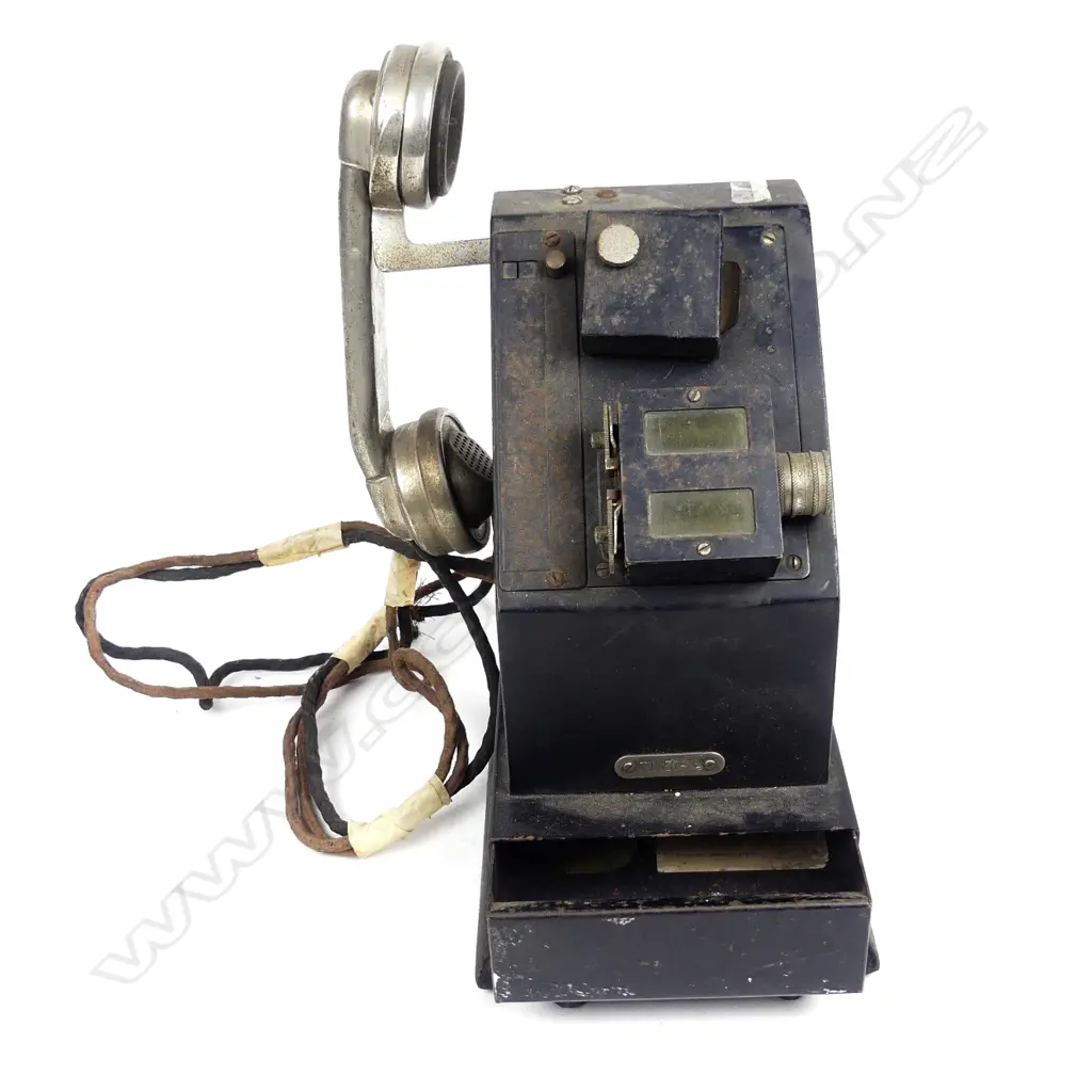 A vintage General Electric public telephone Image 1++