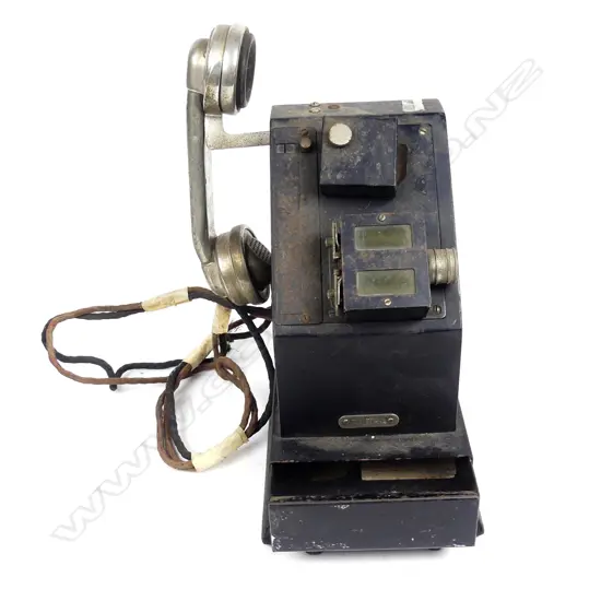 A vintage General Electric public telephone