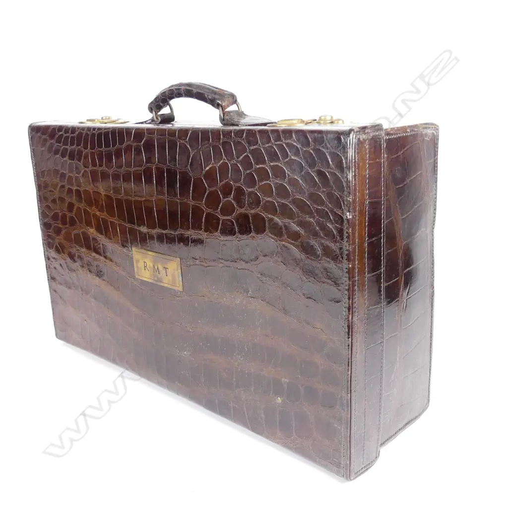 An impressive crocodile skin fitted travelling case Image 1++
