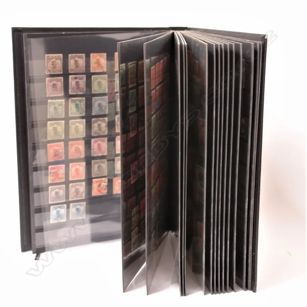 An album of older Chinese stamps Image 1++