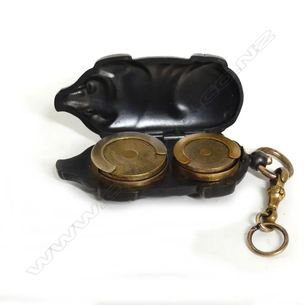 A base metal double sovereign case Image 1++