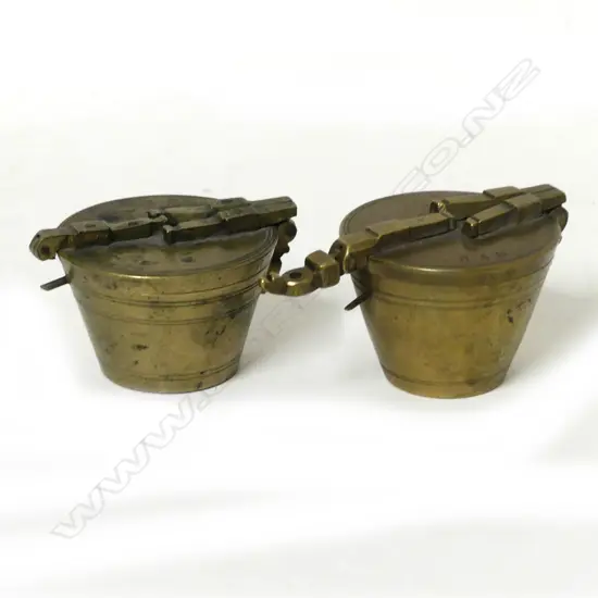 Two sets of German brass nesting bucket weights