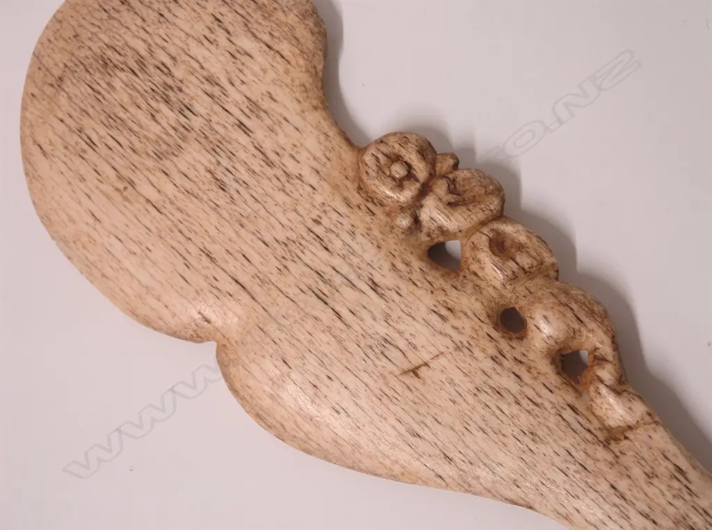 A 19thC Maori carved whalebone wahaika Image 1++