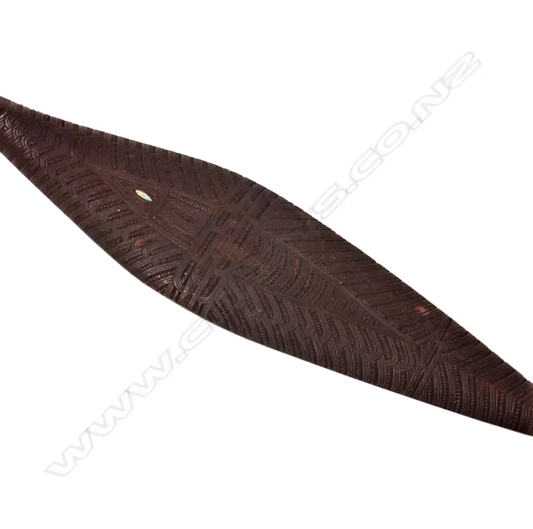 A decoratively carved Maori hoe (paddle) Image 1++