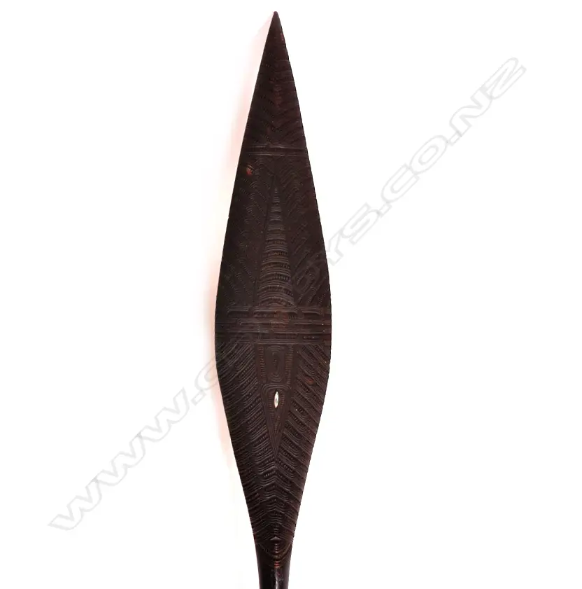 A decoratively carved Maori hoe (paddle) Image 1++