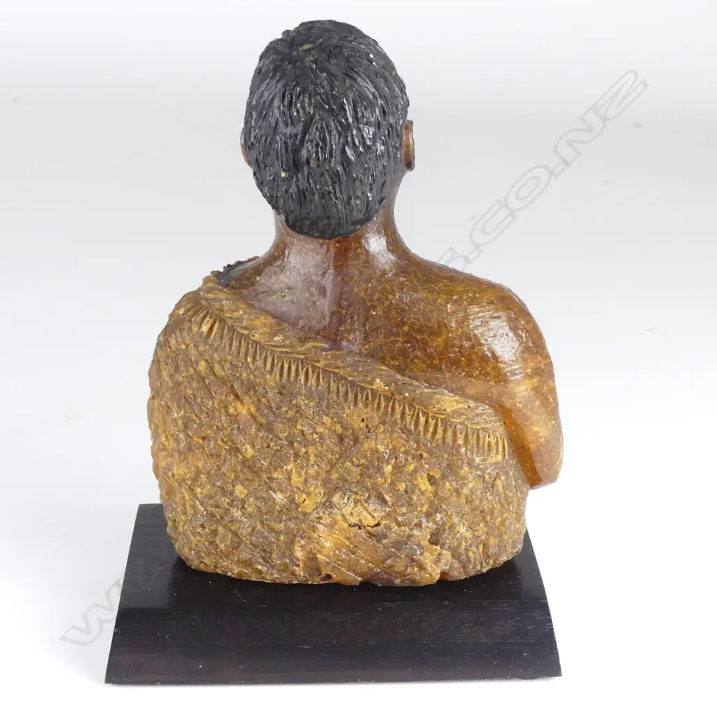 A carved kauri gum head and torso statuette of a Maori warrior Image 1++