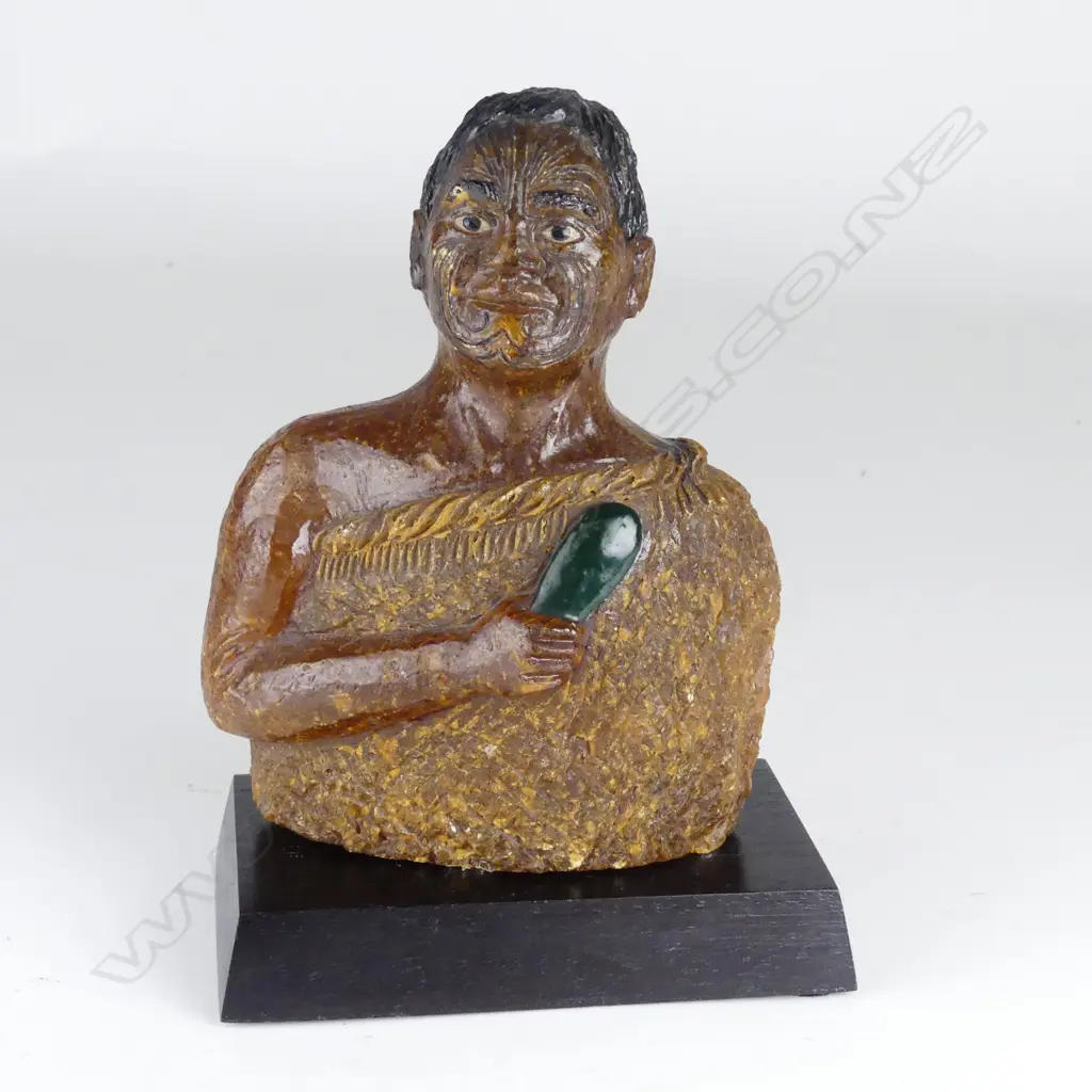 A carved kauri gum head and torso statuette of a Maori warrior Image 1++
