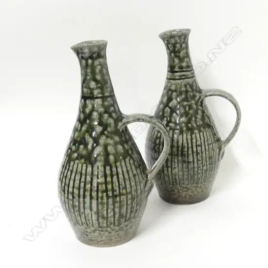 A pair of early ('50s/'60s) Mirek Smisek salt glaze jugs