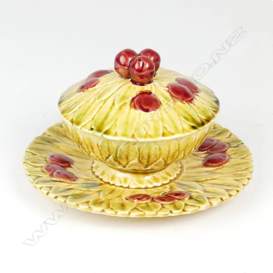 A Sarreguemines majolica dish and cover on fixed saucer