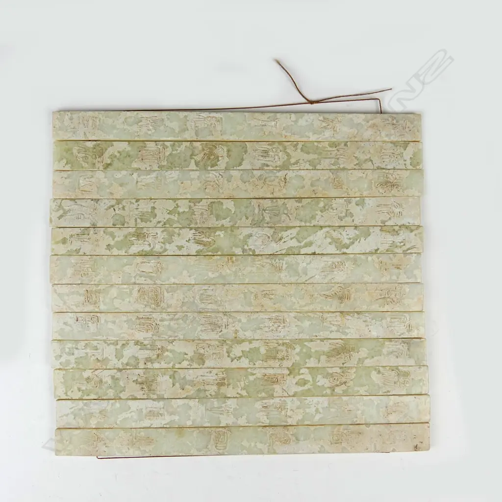 A Chinese pallet of 12 jade tablets Image 1++