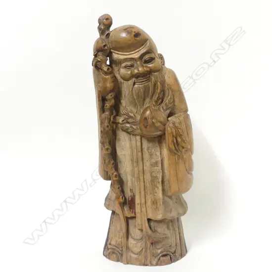 A Chinese carved bamboo figure of Shou Lao