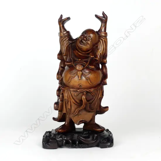 A Chinese rosewood statuette of Budai