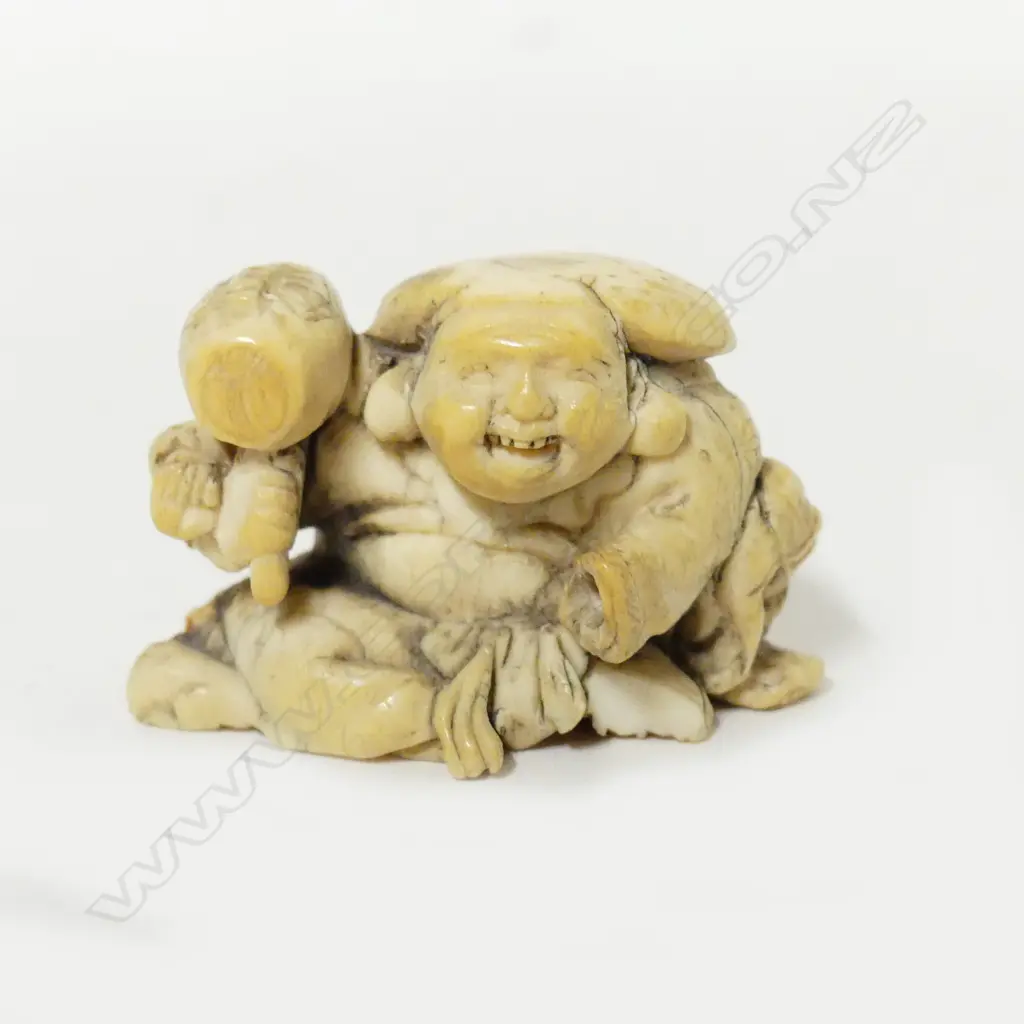 An old ivory netsuke Image 1++