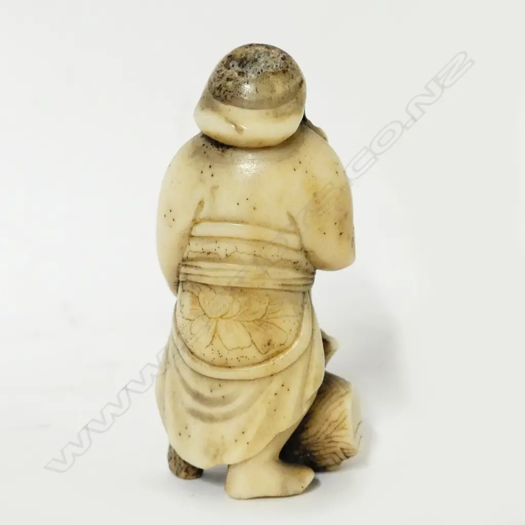 An old deer antler carving of Ebisu Image 1++