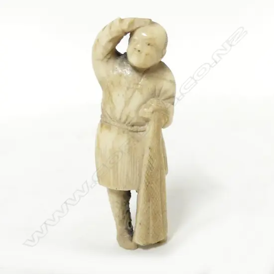 An old deer antler figure