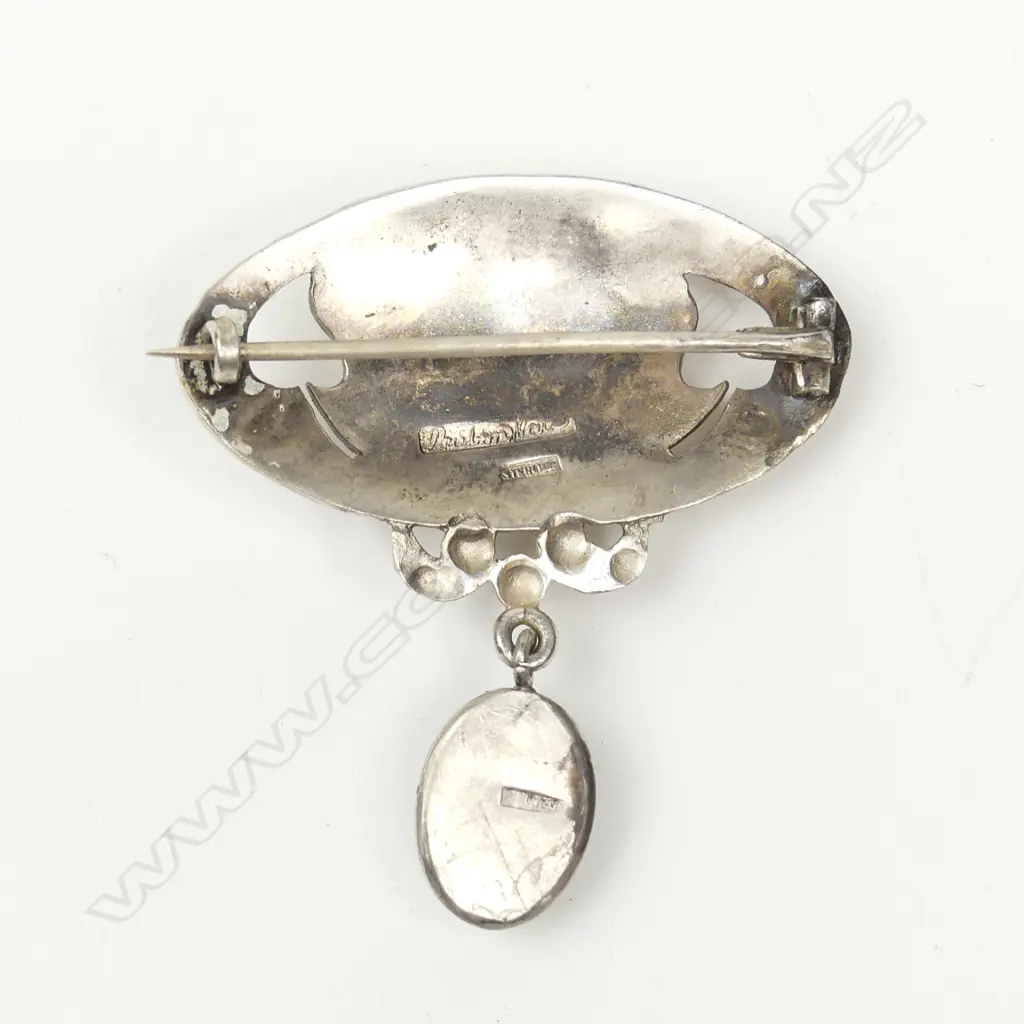 A rare N.Z. Reuben Watts (1869-1940) silver and turquoise brooch Image 1++