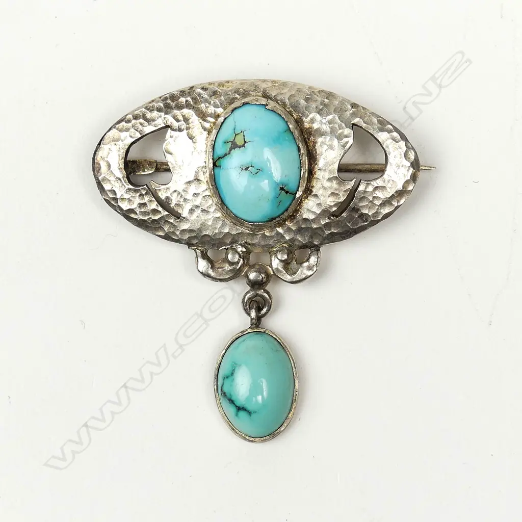 A rare N.Z. Reuben Watts (1869-1940) silver and turquoise brooch Image 1++