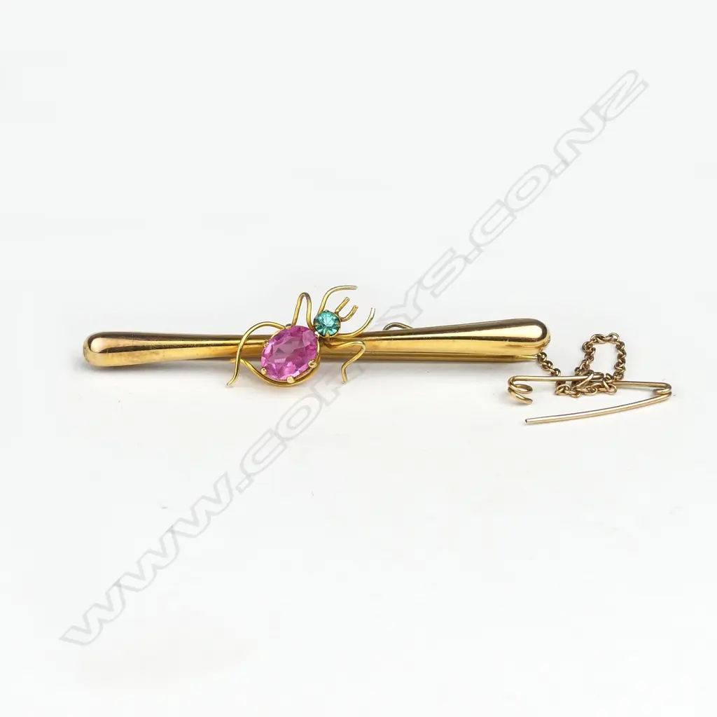 A vintage 9ct. yellow gold and coloured stone inset bar brooch Image 1++