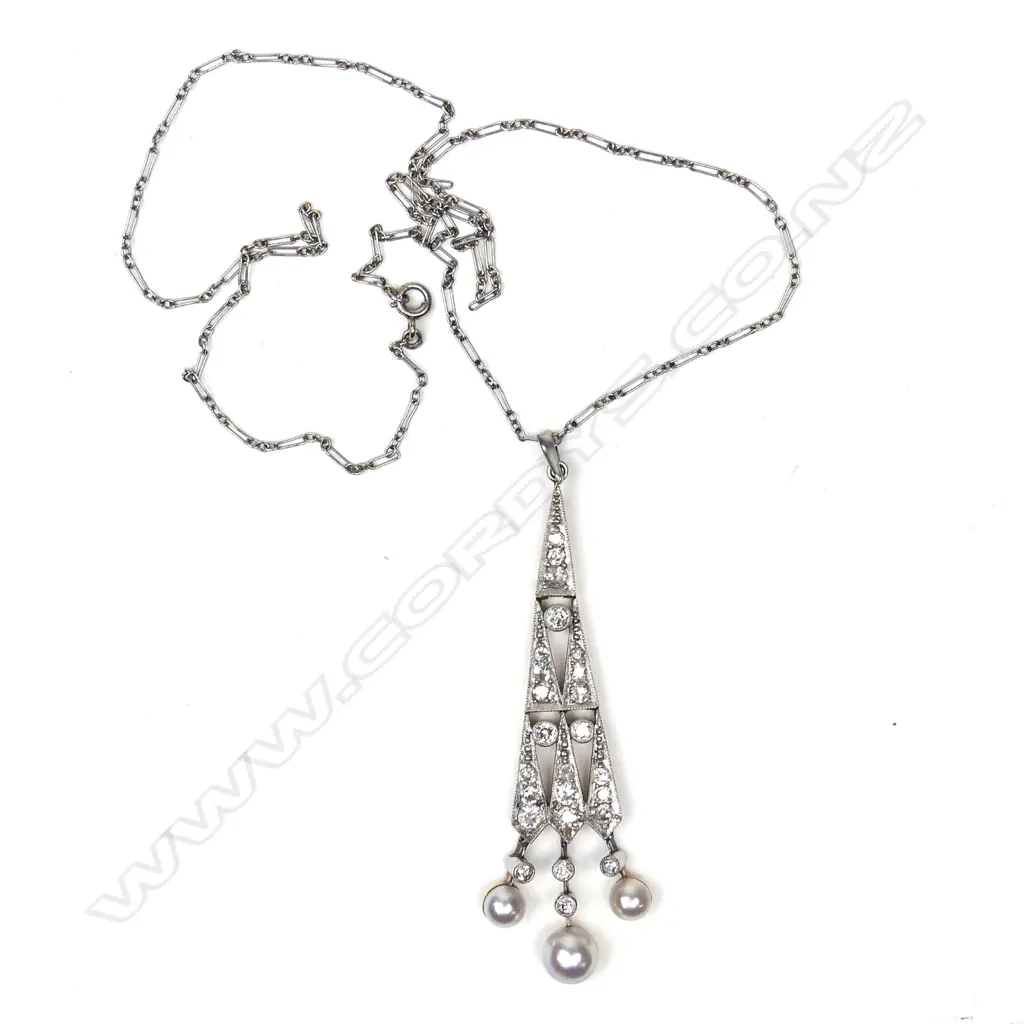 A good Art Deco 15ct. yellow gold platinum diamond and pearl pendant on chain Image 1++