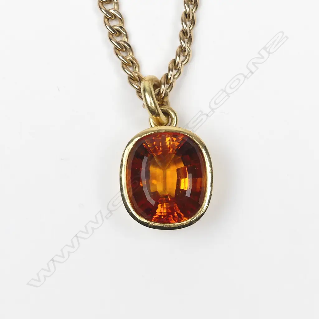 An 18ct gold and citrine pendant Image 1++