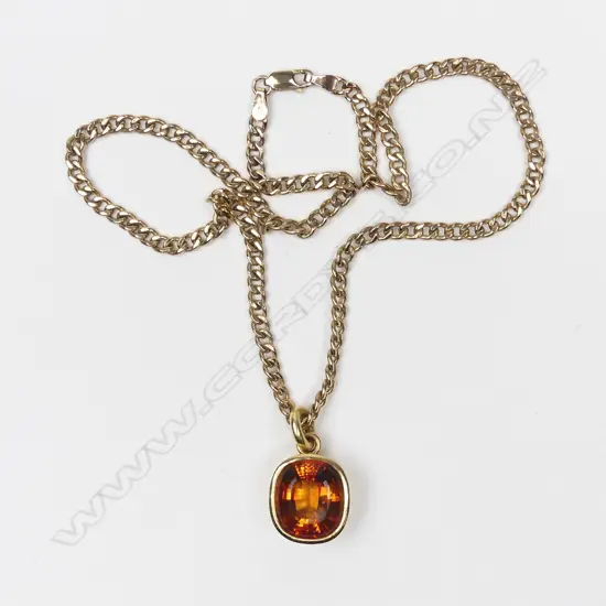 An 18ct gold and citrine pendant