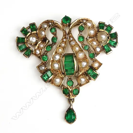 A c.1900 15ct. gold green stone and seed pearl pendant