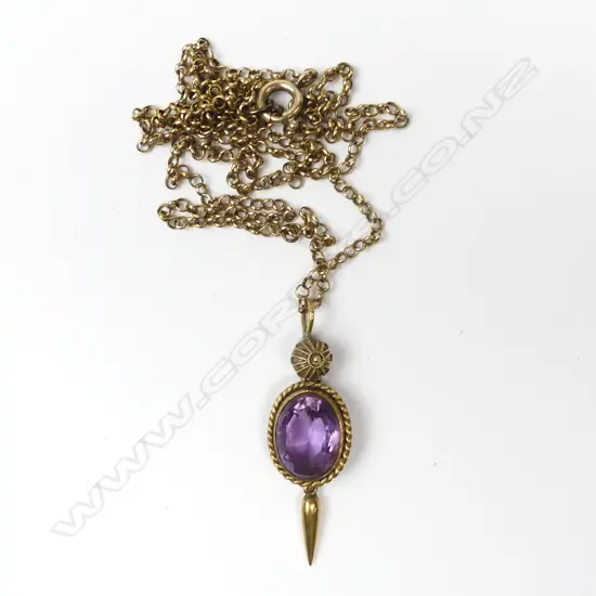 An early 20thC 18ct. yellow gold and amethyst pendant on chain