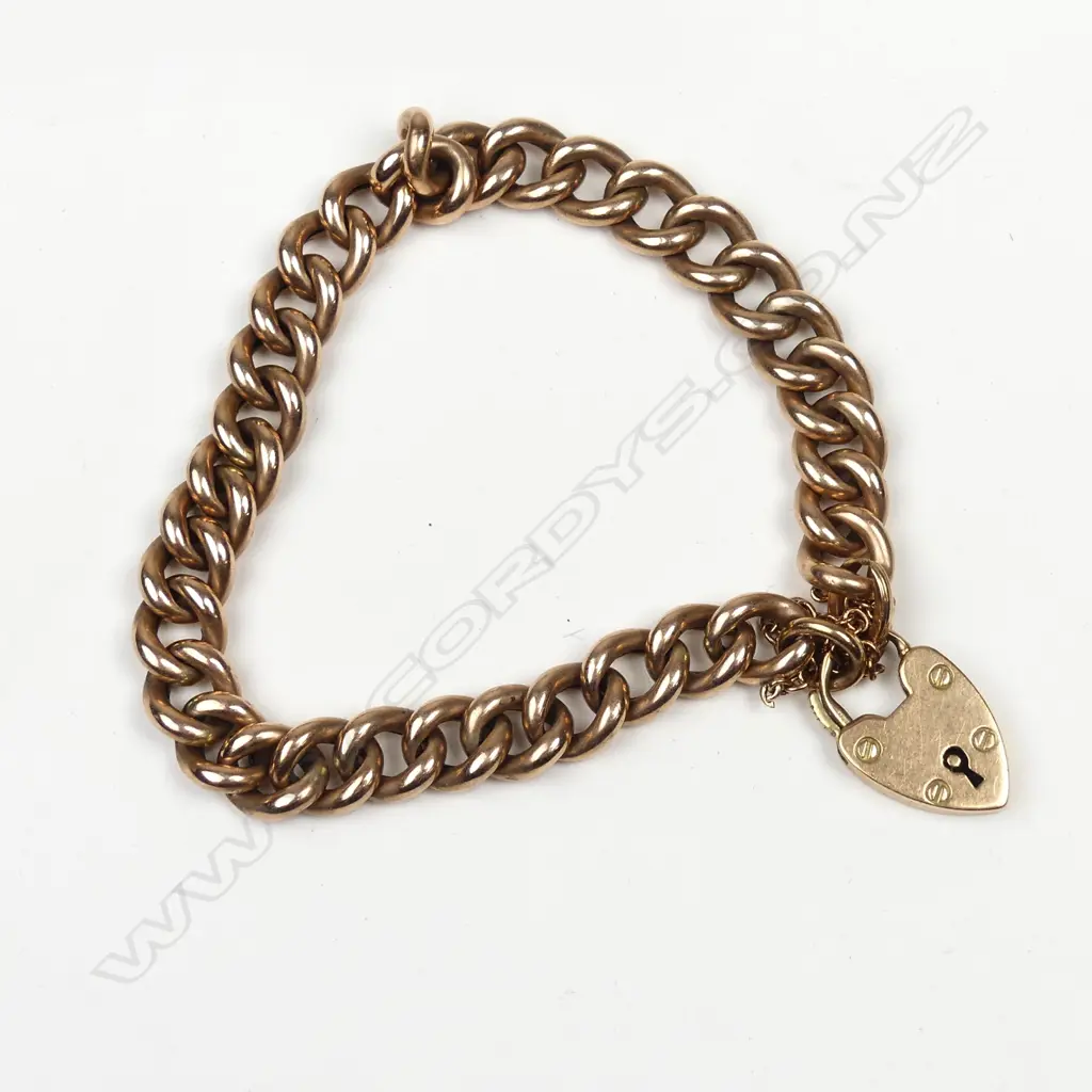 An early 20thC 9ct. rose gold curb link bracelet Image 1++