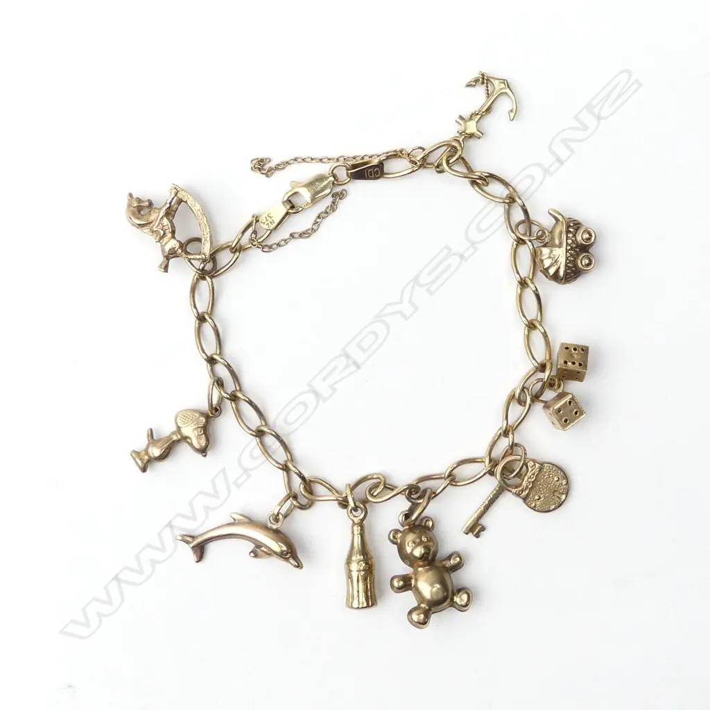 A 9ct. charm link bracelet Image 1++