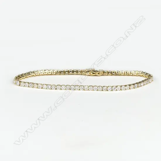 A 14ct gold and diamond tennis bracelet