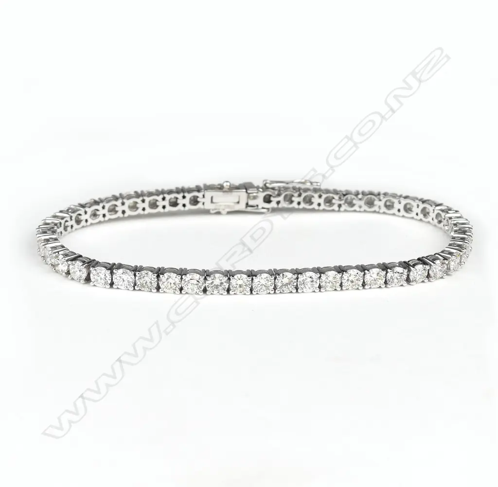 A 14ct white gold and diamond tennis bracelet Image 1++