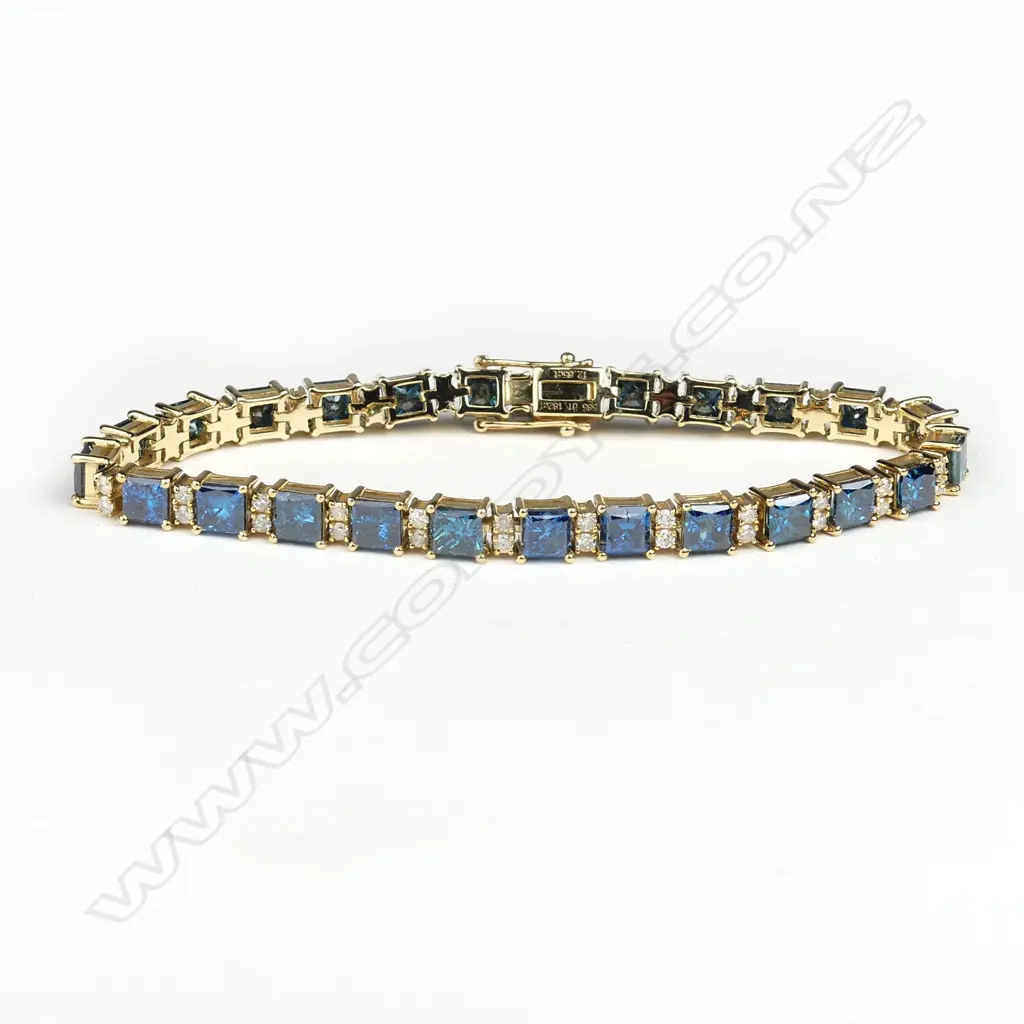 A 14ct gold and diamond tennis bracelet Image 1++