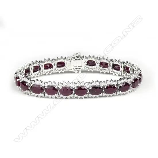 A 14ct white gold ruby and diamond bracelet