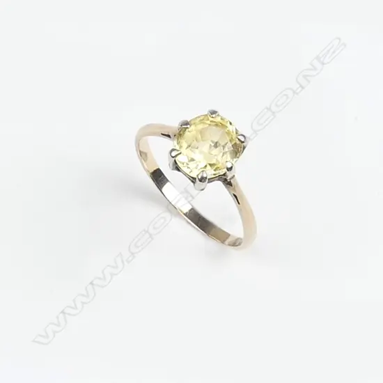 An estate 18ct. yellow gold and golden sapphire dress ring