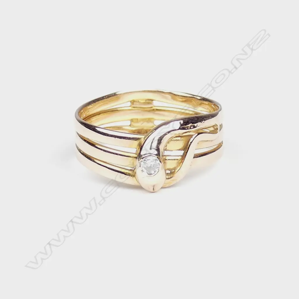 A c.1900 18ct. yellow gold diamond set snake ring Image 1++