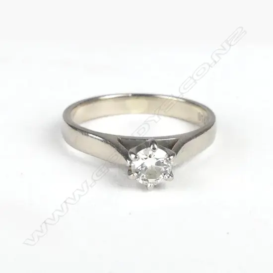 An 18ct white gold and diamond solitaire ring