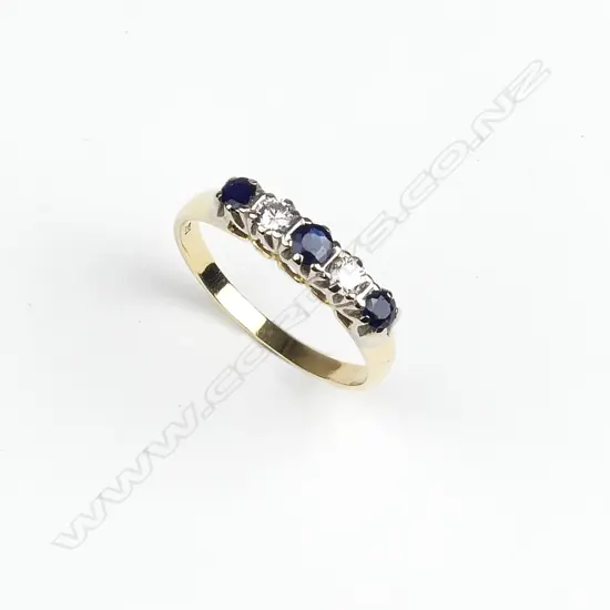 An estate 18ct. yellow gold sapphire and diamond ring