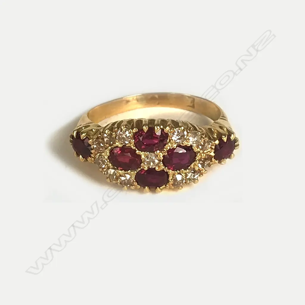 An 18ct. gold ruby and diamond ring Image 1++